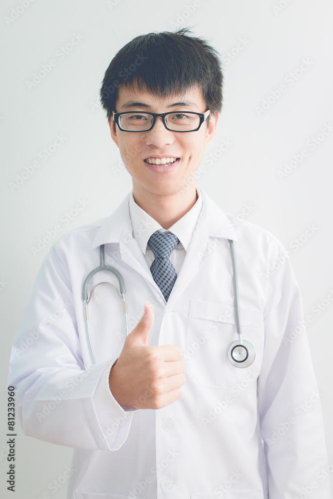 close up of male doctor hand showing thumbs up