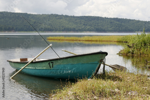 Rowing boat on the river Bank.