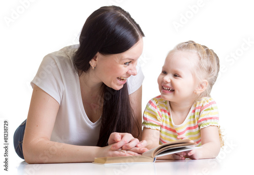 mother teaches reading book...