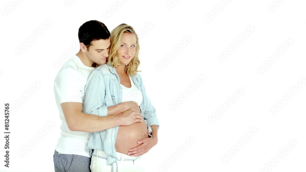 young expecting parents touching pregnant belly on white young expecting parents touching pregnant belly on white
