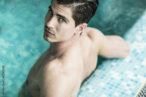 Young man in the pool © BGStock72