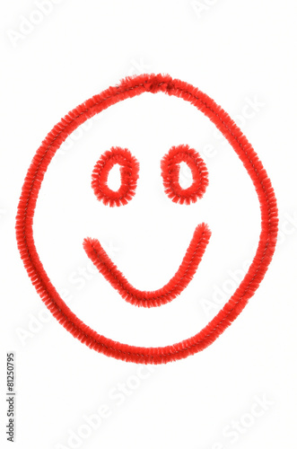 Happy Face Made Out Of Red Pipe Cleaners on White