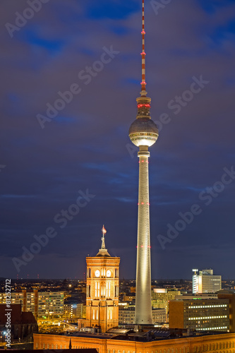 The famous TV Tower and the red townhall in Berlin at night