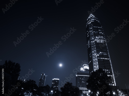 Trade Fair Tower, Messeturm,with full moon in Frankfurt, Germany