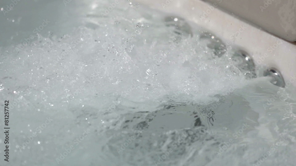 slow motion bubbling water in whirlpool