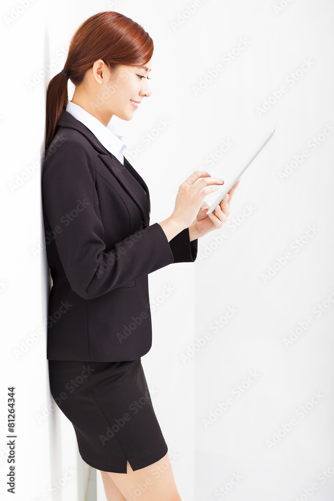 young business woman using tablet pc in office young business woman using tablet pc in office