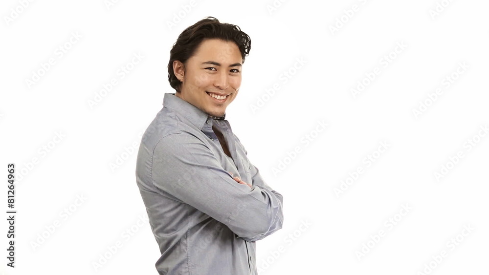 Handsome man wearing a grey shirt walking. White background. Handsome man wearing a grey shirt walking. White background.