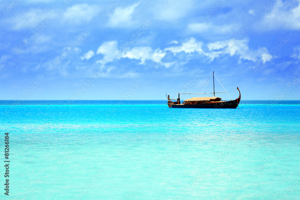 View of beautiful blue ocean water with ship in resort View of beautiful blue ocean water with ship in resort