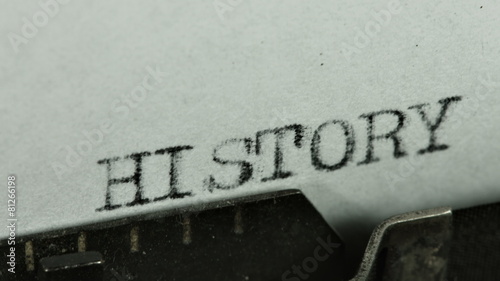 Vintage typewriter writing words _—– history themes photo