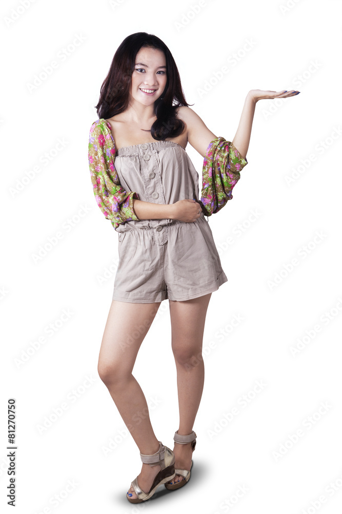 Teen girl with presenting gesture Teen girl with presenting gesture