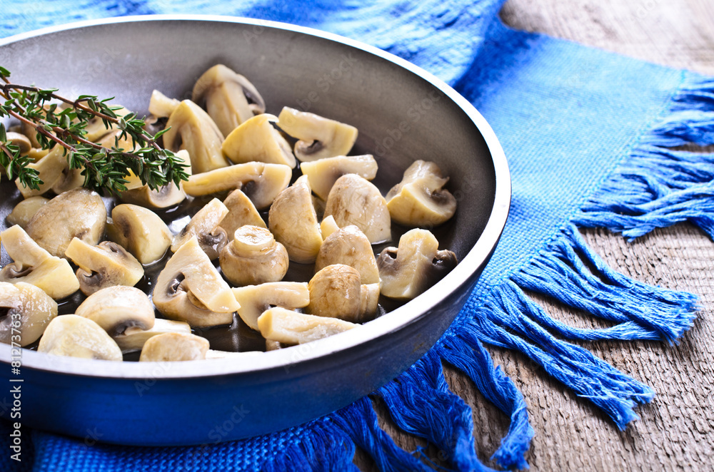 The mushrooms in the pan