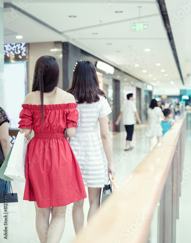 Photography girl shopping at luxury mall in kowloon shanghai china