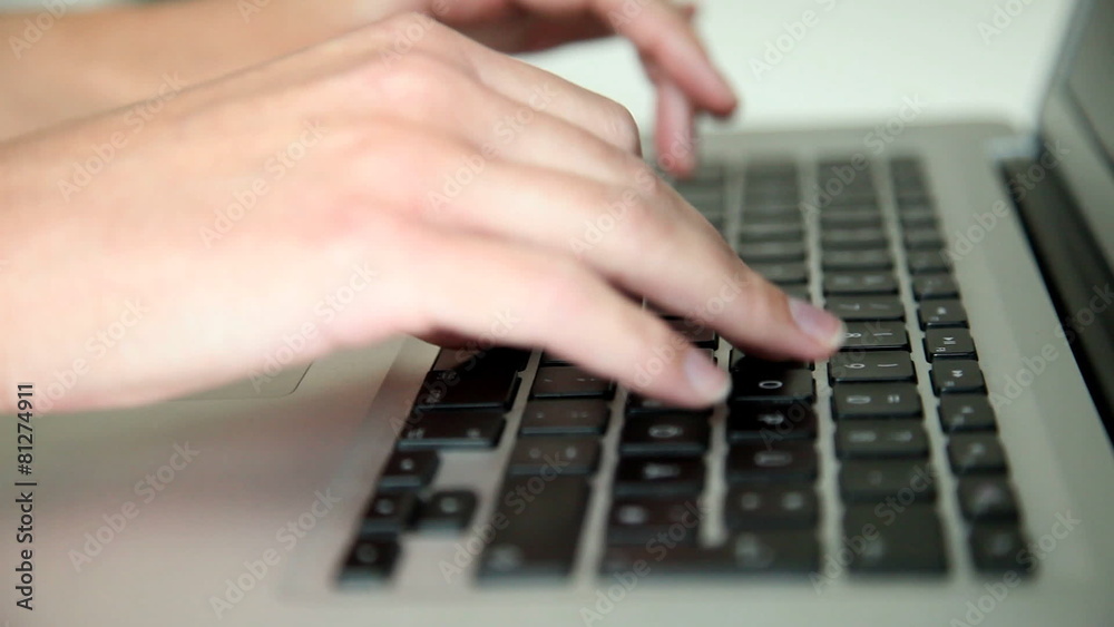 Tracking shot of woman’s hands typing on keyboard Tracking shot of woman’s hands typing on keyboard