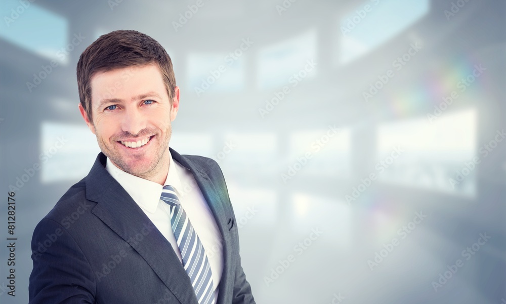 Composite image of businessman smiling and offering his hand Composite image of businessman smiling and offering his hand