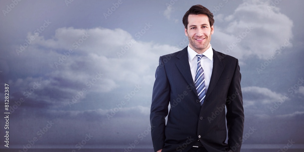Smiling businessman standing Smiling businessman standing