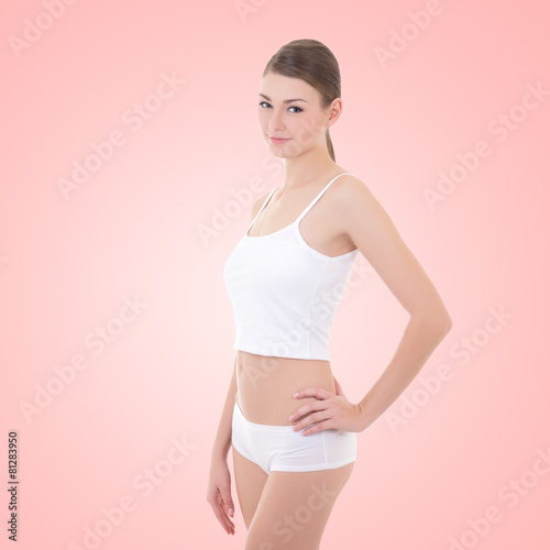 young woman in cotton underwear over beige © Di Studio