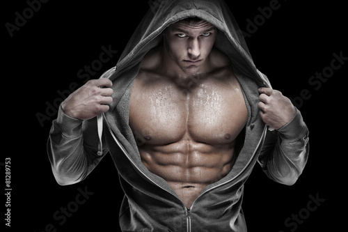 Strong Athletic Man Fitness Model Torso showing six pack abs. is