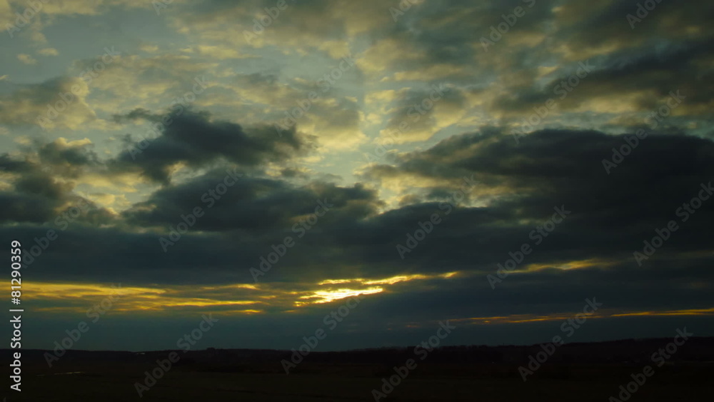 The picturesque sunset (sunrise) with clouds above land The picturesque sunset (sunrise) with clouds above land