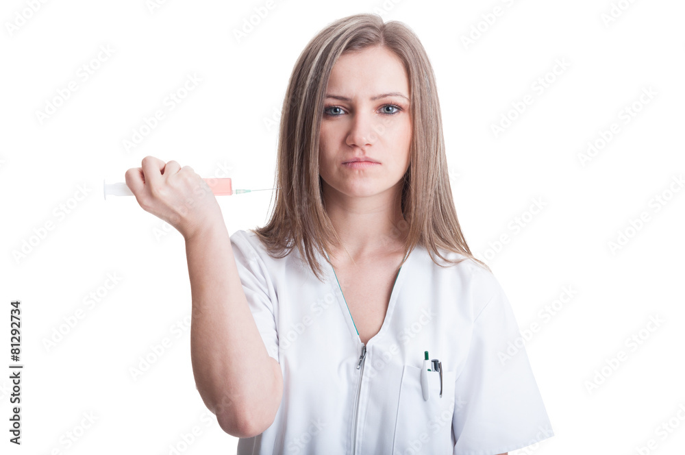 Obraz premium Beautiful nurse ready to inject herself using a syringe