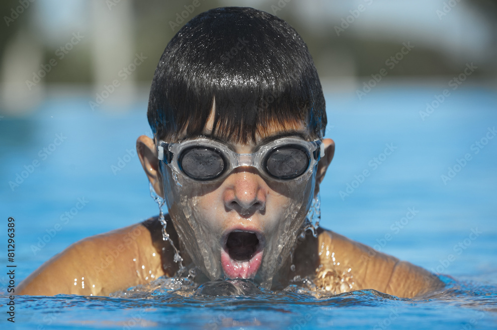 Fototapeta premium Young swimming in the pool.