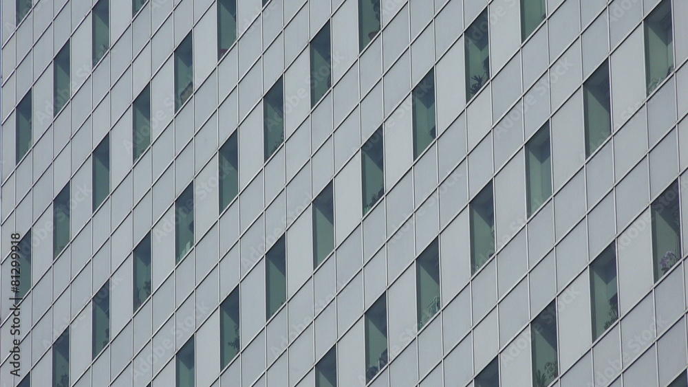 Grey office windows exterior, tilt motion Grey office windows exterior, tilt motion