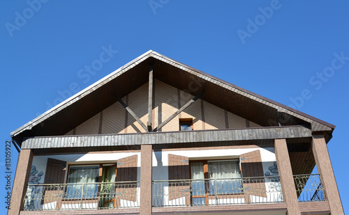 Pediment of the guest house against the blue sky