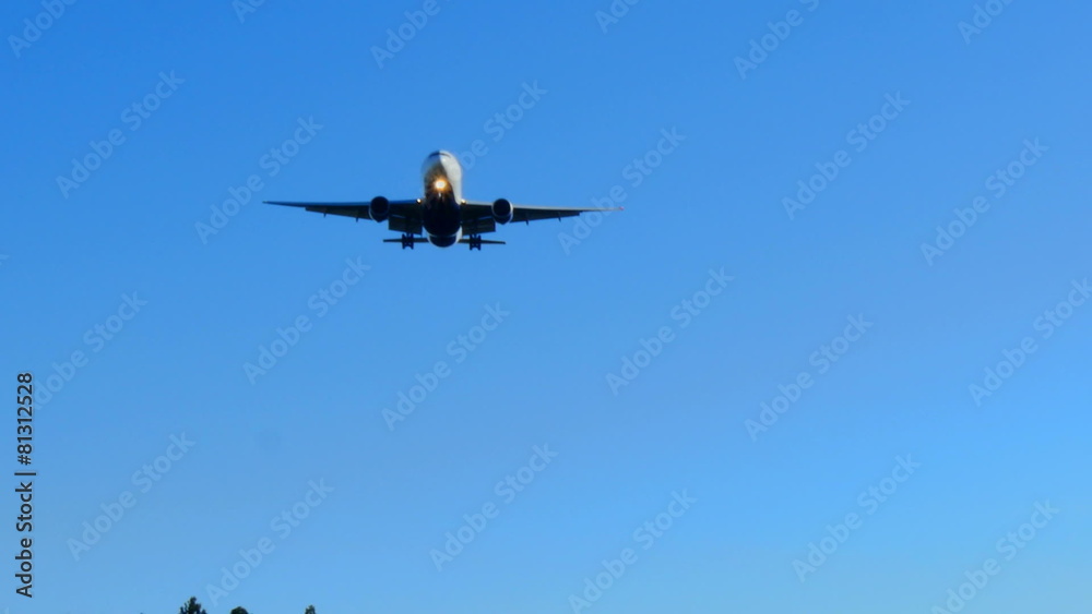 Airplane approaching in clear skies Airplane approaching in clear skies
