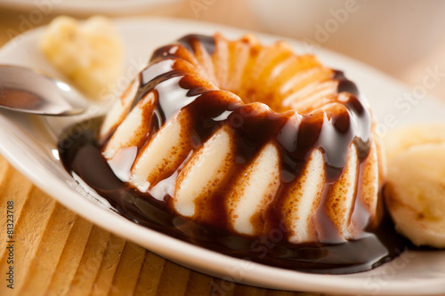 pudding dessert with choccolate syrup photo