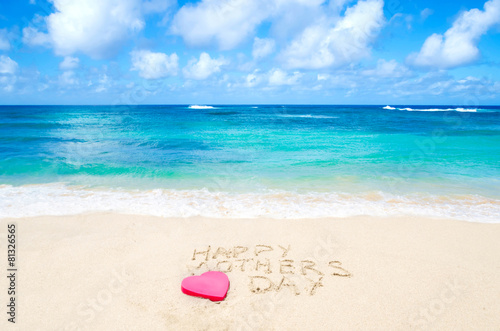Sign "Happy mothers day" on the beach