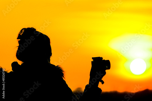 Silhouette photographer - background yellow