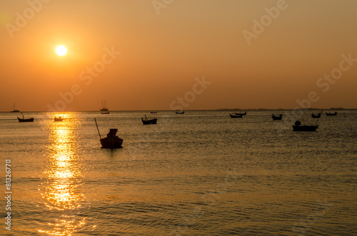 silhouette boat in the sunset time © gigsuppajit