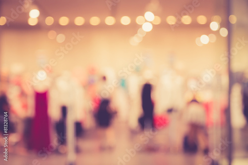 Blurred image of people in shopping mall with bokeh