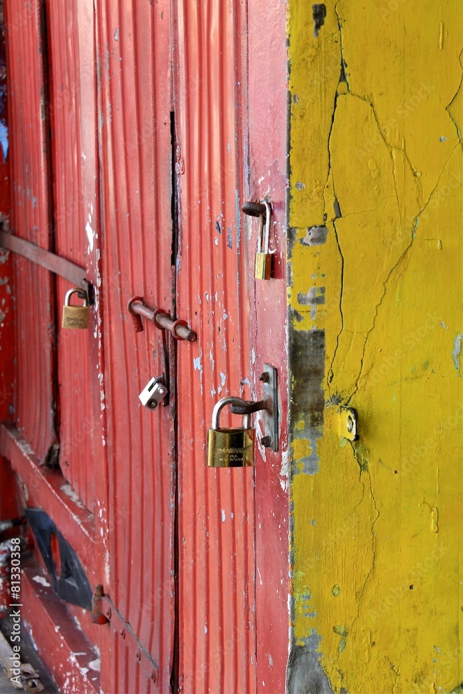 Locks on red doors