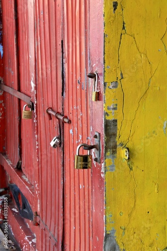 Locks on red doors