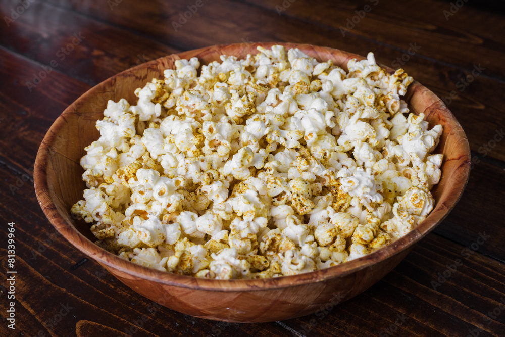Spiced Popcorn in a Wooden Bowl Spiced Popcorn in a Wooden Bowl