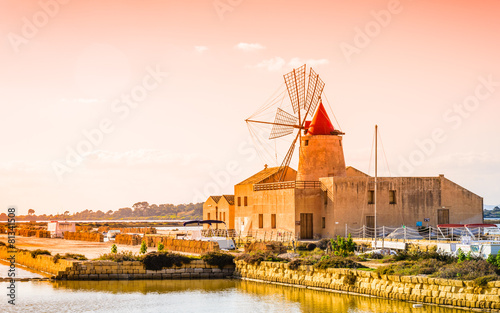 Fotografie Trapani windmill in Sicily, sea salt production, Italy.