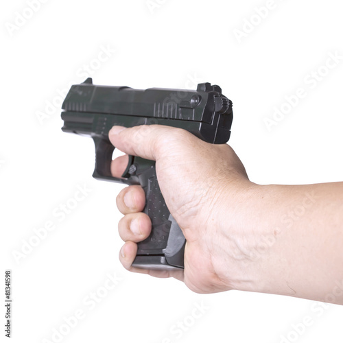 hand holds gun isolated on white background.