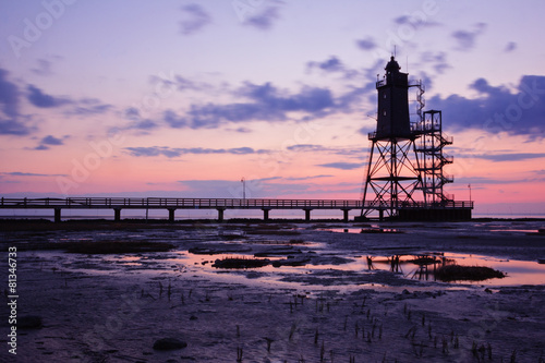 Wattenmeer und Leuchtturm im Abendlicht – Dorum