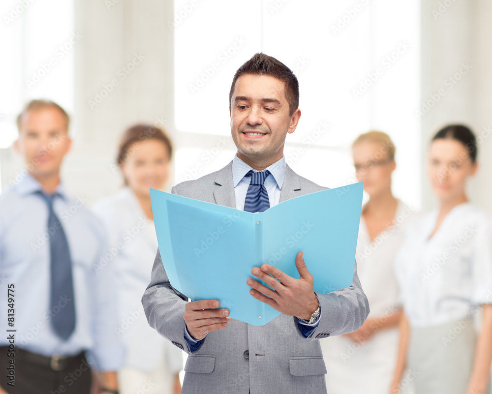 happy businessman with open folder happy businessman with open folder