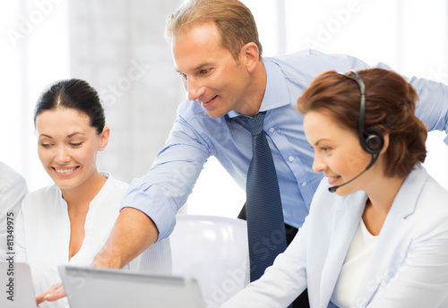 group of people working in call center