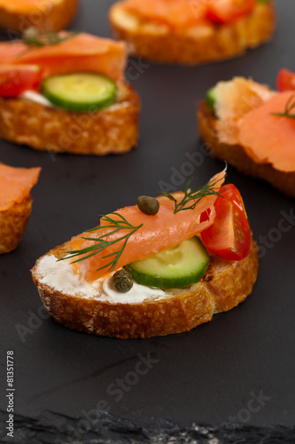 Finger food canape with smoked salmon