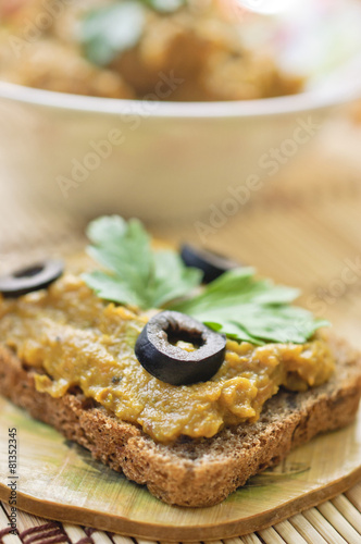 Squash caviar with olives, parsley and rye bread