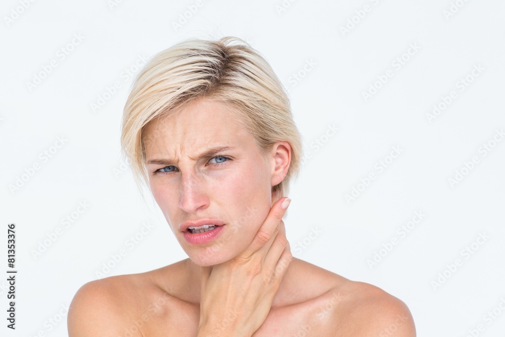 Pretty blonde suffering from throat pain Pretty blonde suffering from throat pain