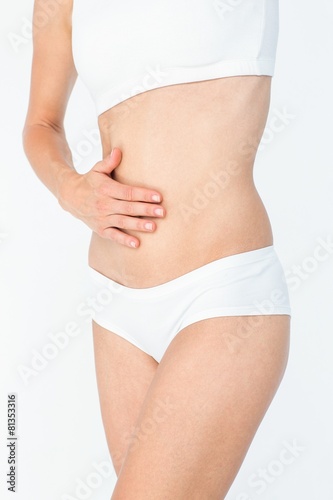 Woman touching her belly