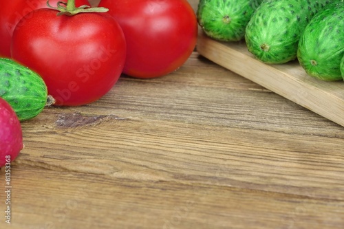 Vegetable Salad Ingredients On The Wood Cutting Board