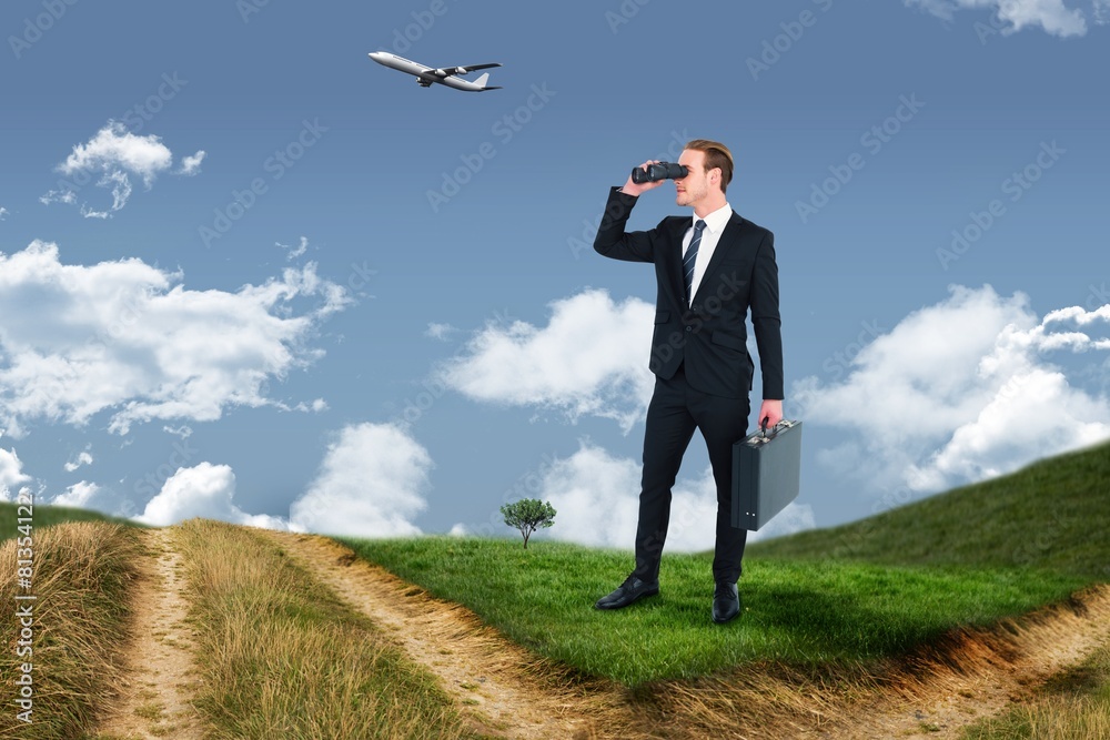 Composite image of businessman looking through binoculars Composite image of businessman looking through binoculars