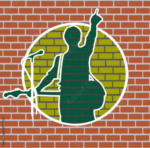 drawing rock musician on a brick wall