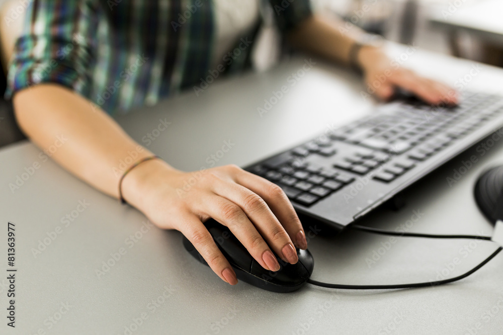 Close up of a woman using computer Close up of a woman using computer