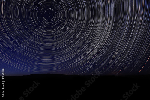 Canvas-taulu Night Exposure Star Trails of the Sky