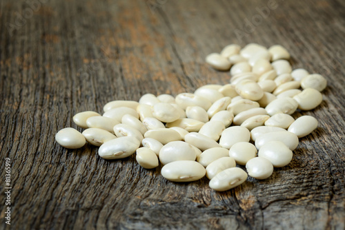 Beans isolated on a wooden texture